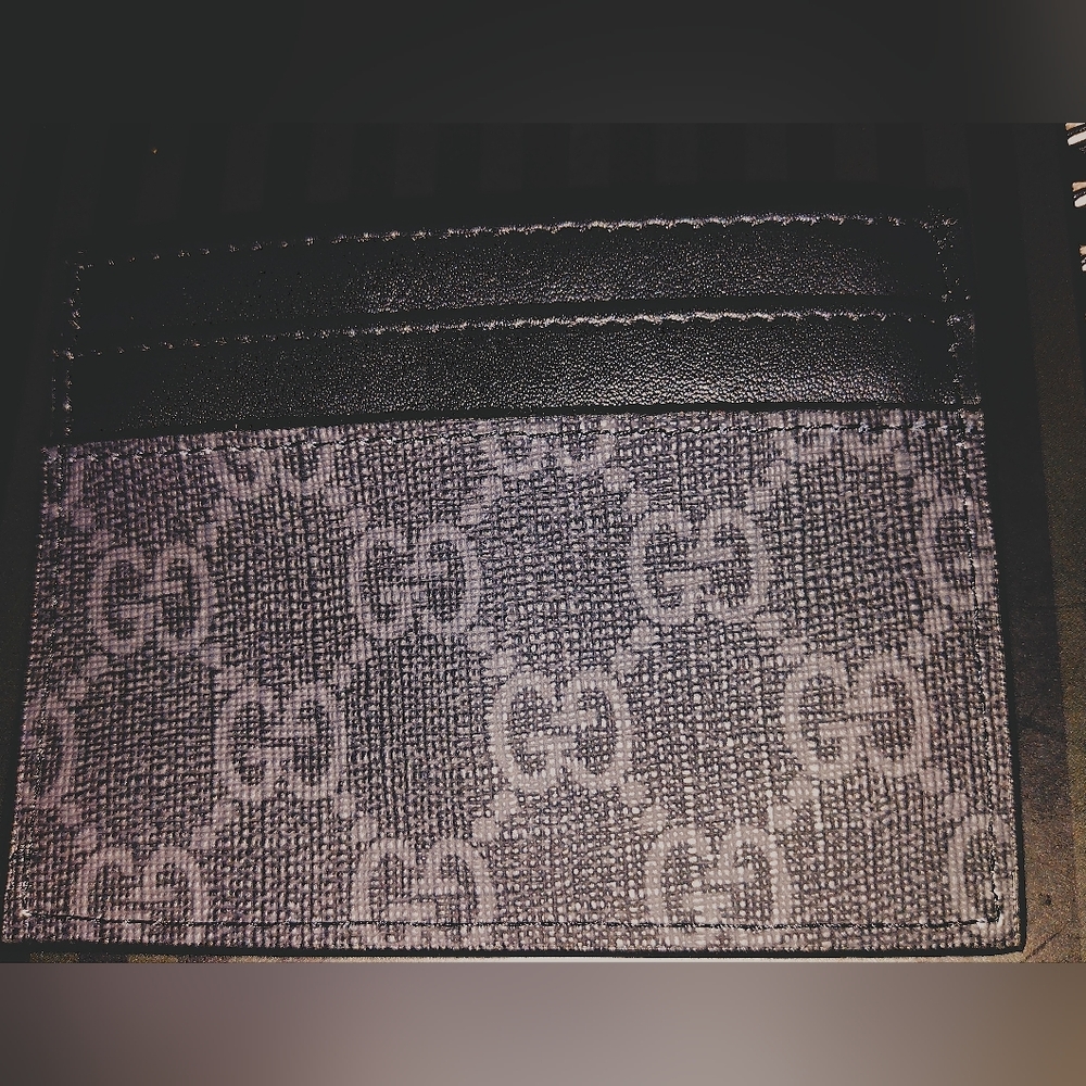 Gucci Card Wallet never carried. Serial Number is listed
